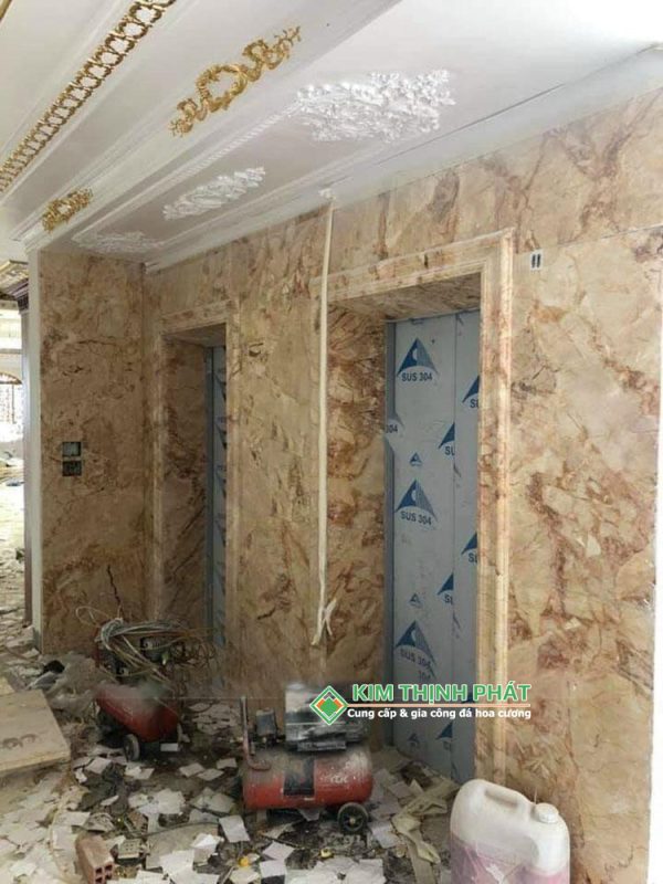 Đá Marble Sky Gold ốp mặt tiền cầu thang máy