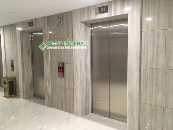 Đá Marble Trắng Volakas mặt tiền cầu thang máy